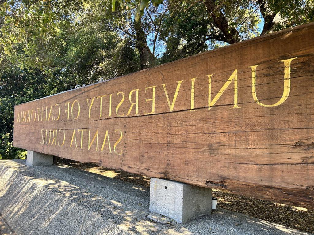 Wooden sign with the words, University of California, Santa Cruz